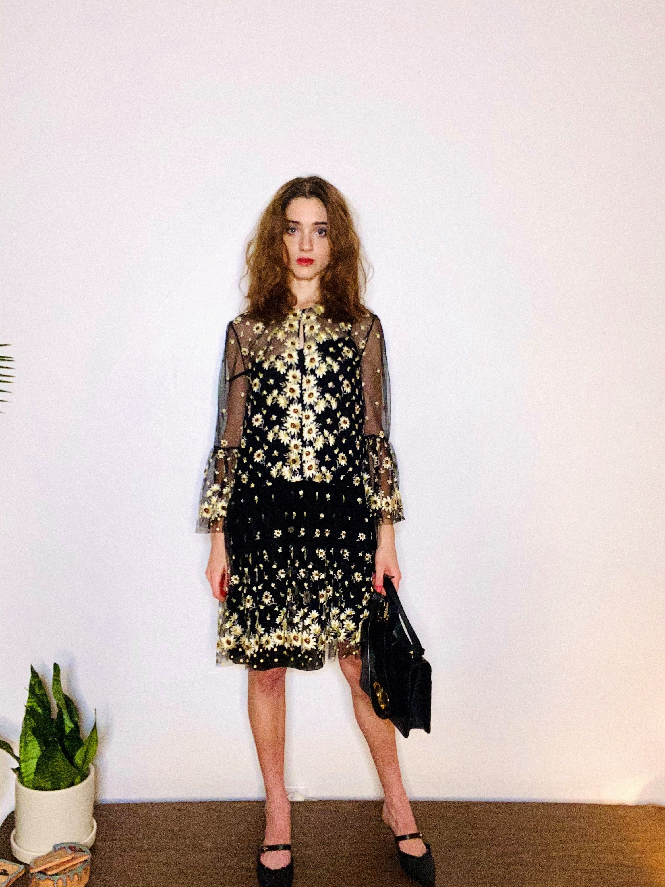 Emma Chamberlain in Black Dress & Mary Janes at Louis Vuitton