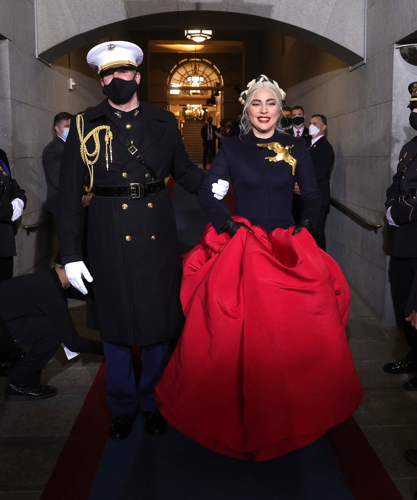 Lady Gaga’s Inauguration Look Is A Symbol Of Hope — & Reminiscent Of The Hunger Games