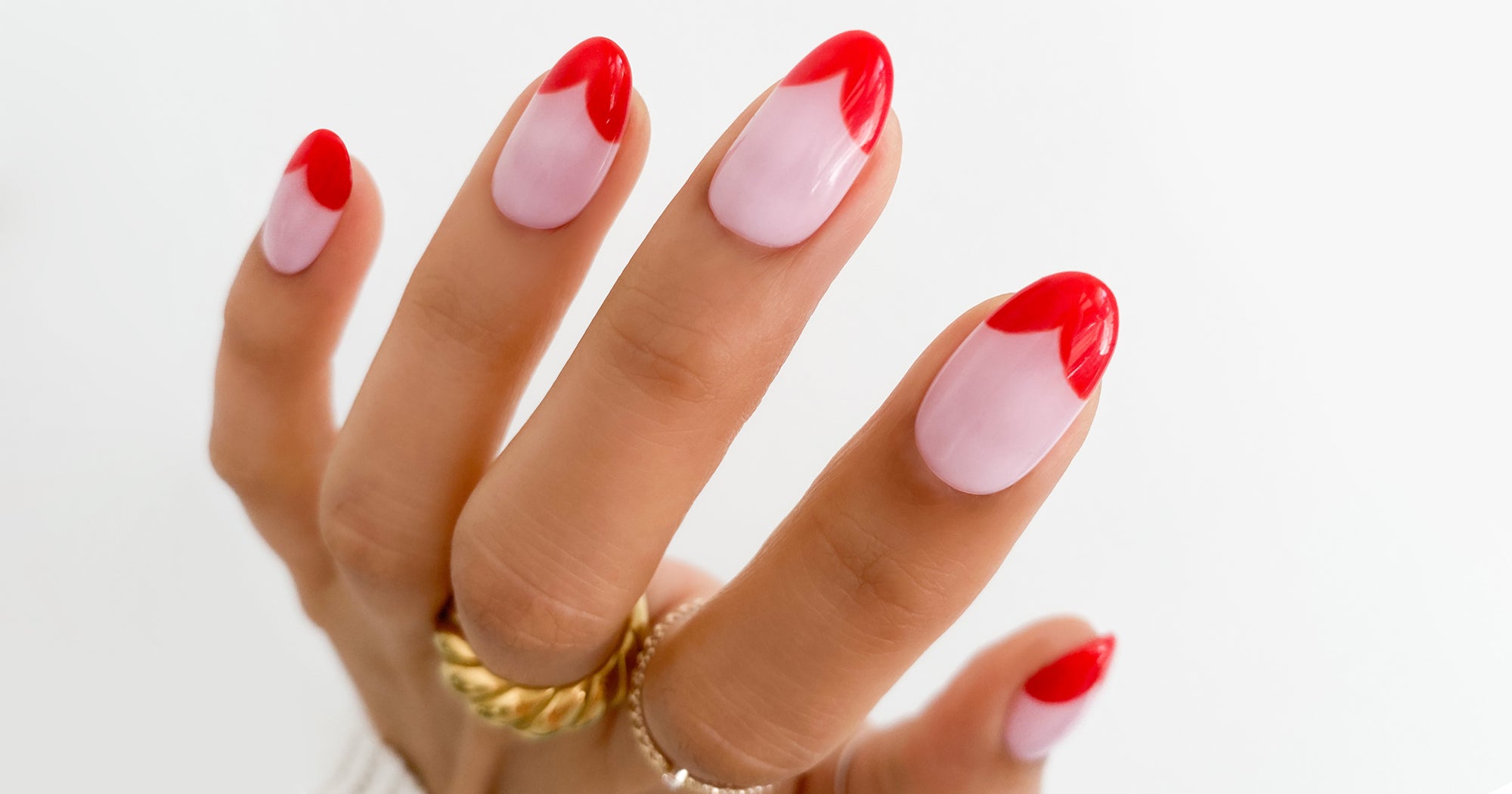 The almond-shaped French tip nail wants to feel like a coquette. - Runway