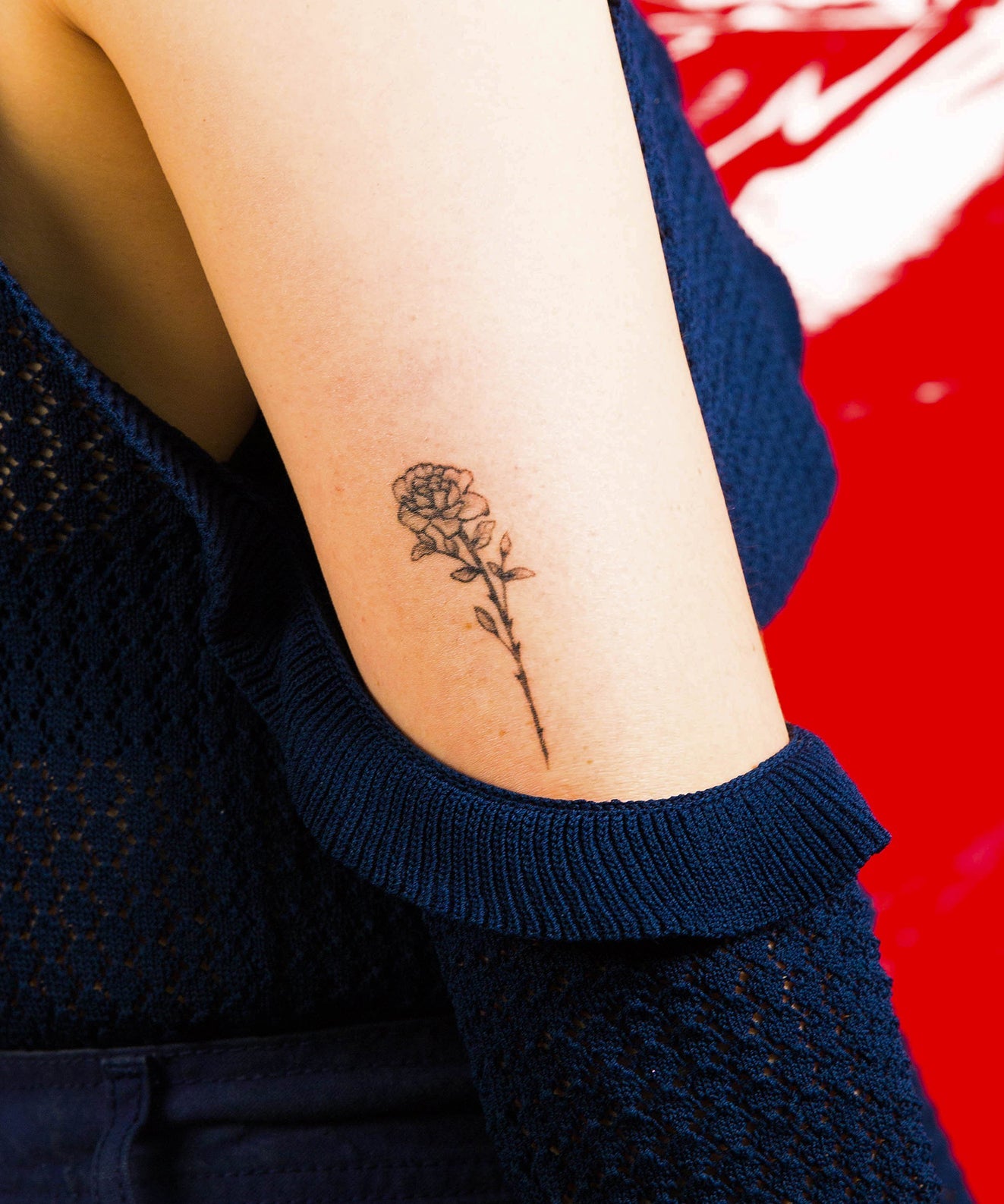 Tiny rose tattoo by Mallory Swinchock TattooNOW