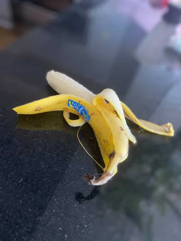 What Is The Right Way To Eat A Banana? A Very Serious Investigation 2 peeled banana on kitchen counter