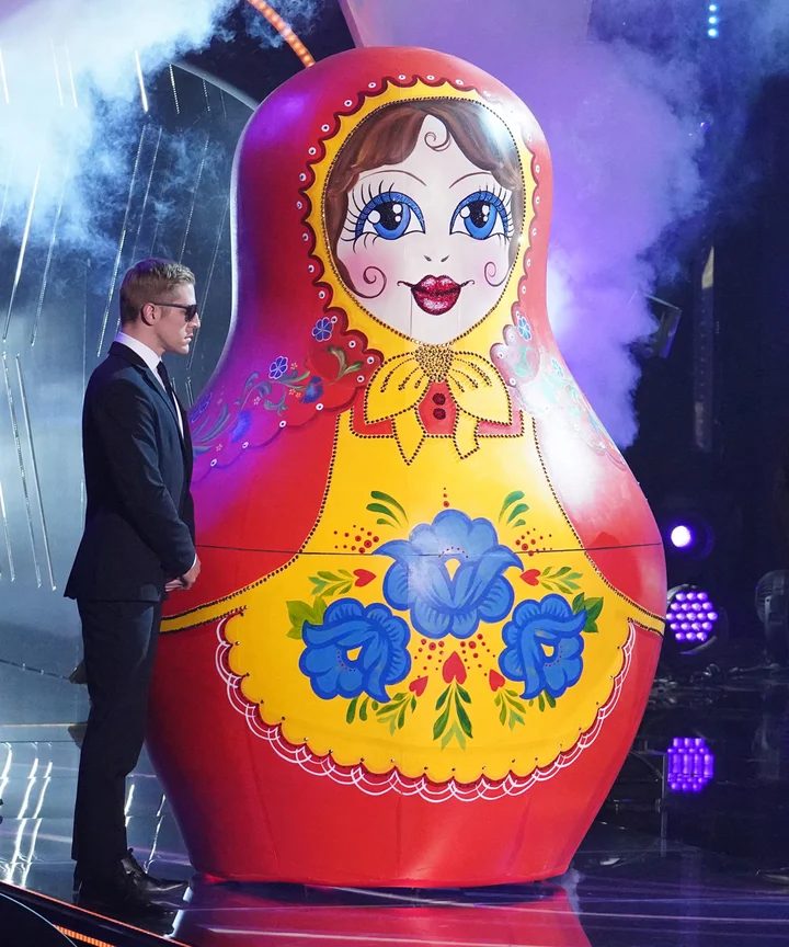 Clues Hanson Is Inside Russian Dolls On Masked Singer