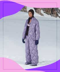 Miu Miu model wearing a purple, quilted jacket and matching pants during the fall '21 show in the snow.