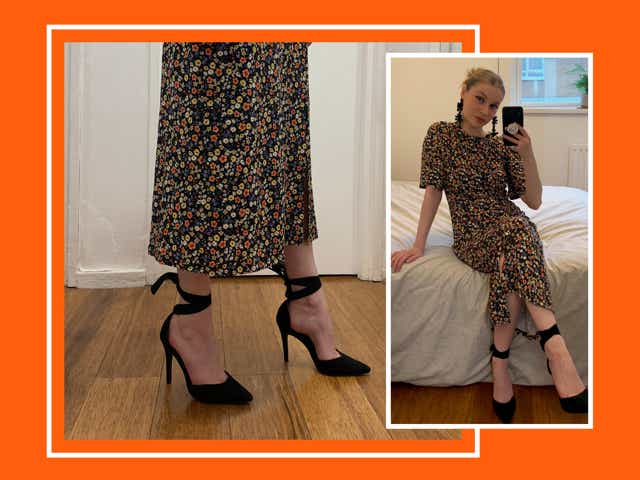 Alicia wearing a floral Mauvette midi dress and black heels