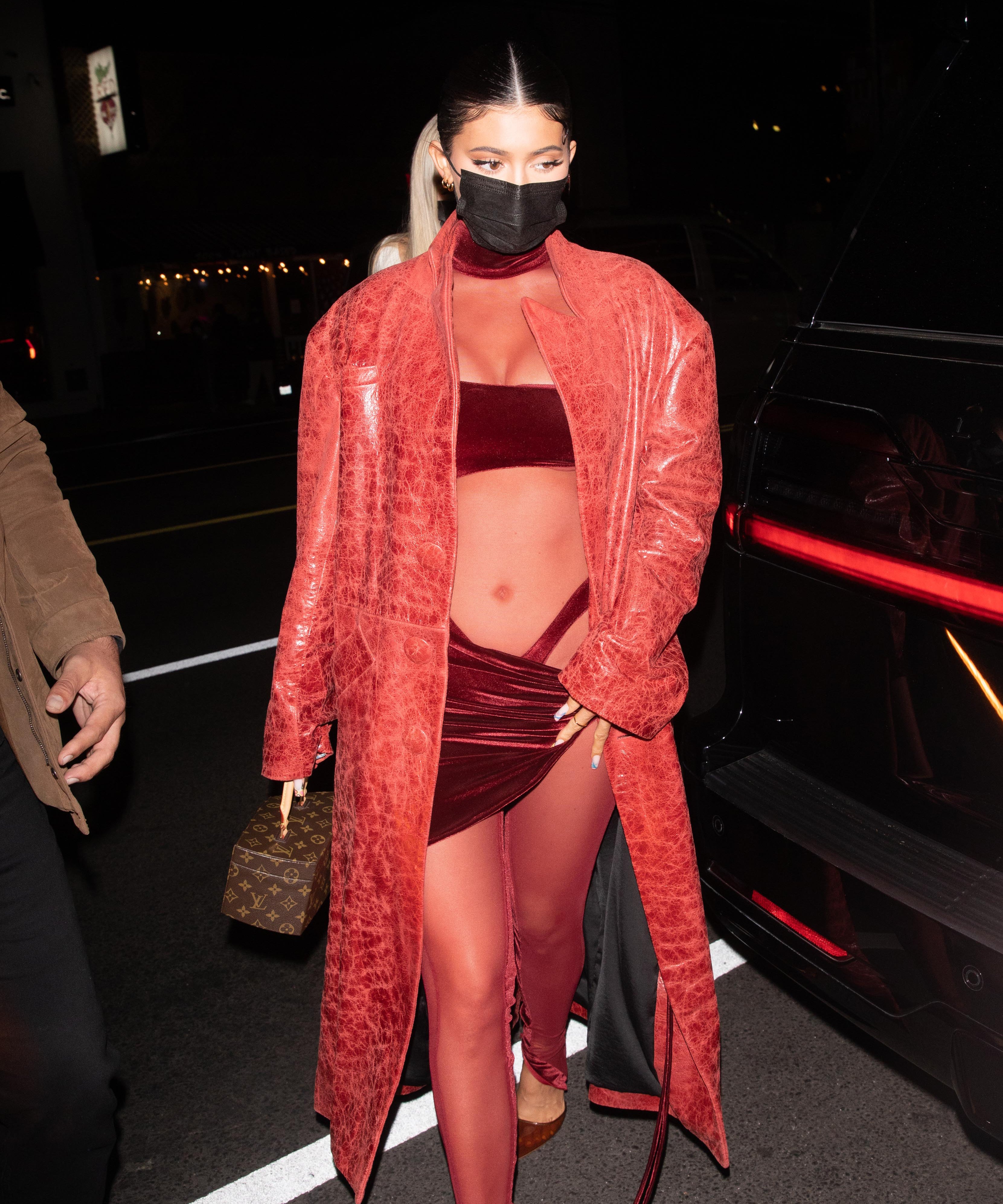 Kylie Jenner: Black Turtleneck, Crystal Skirt
