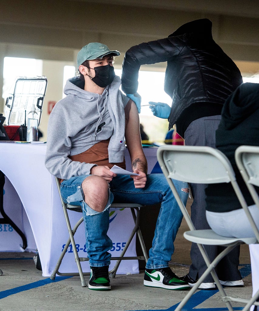 What Are “Vaccine Tourists”? Here’s What To Know Vaccine Tourists