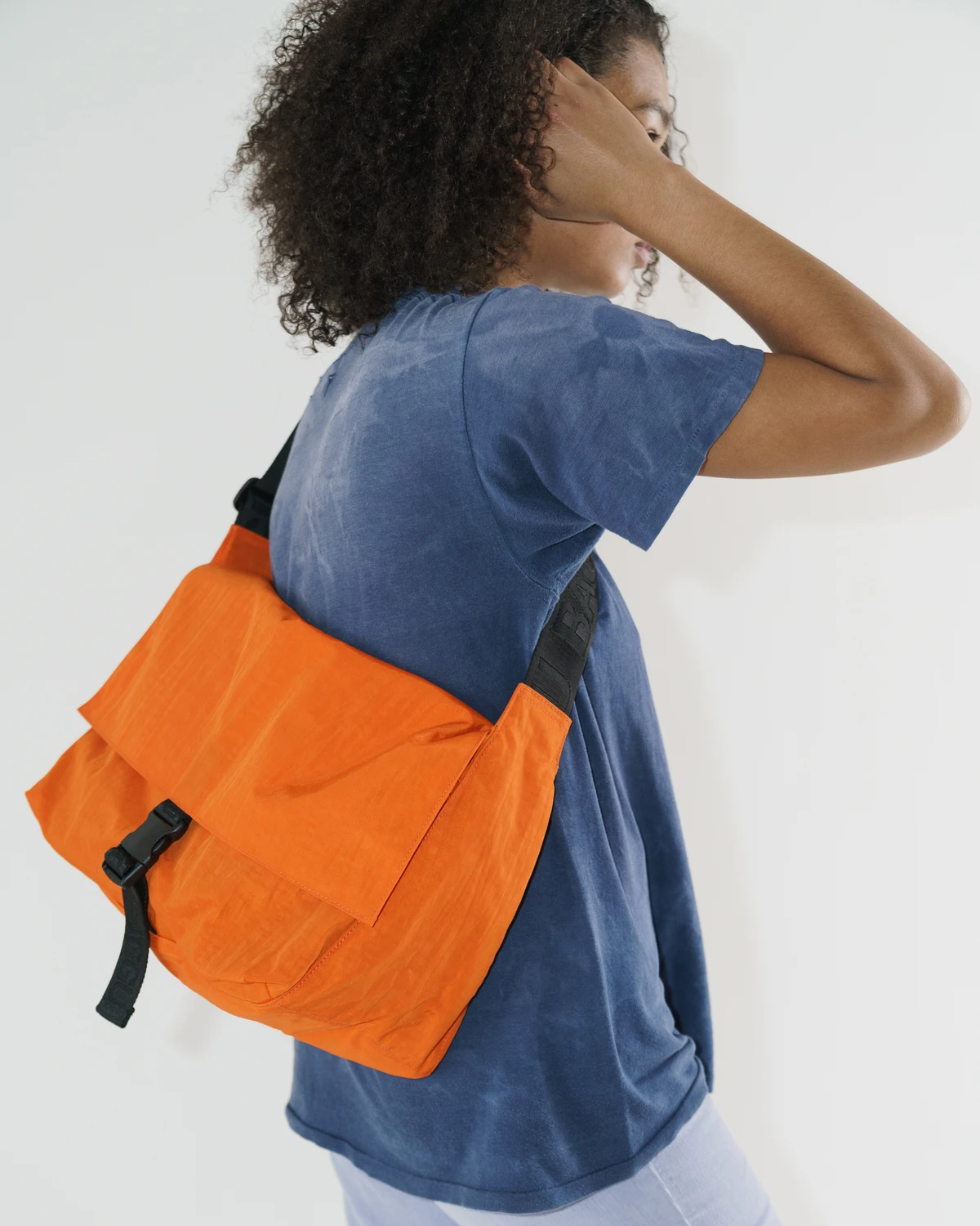 Athletic top messenger bag