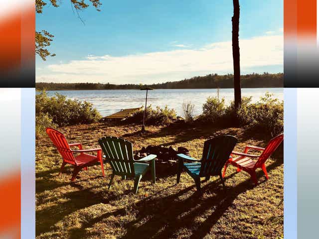 four chairs by a lake