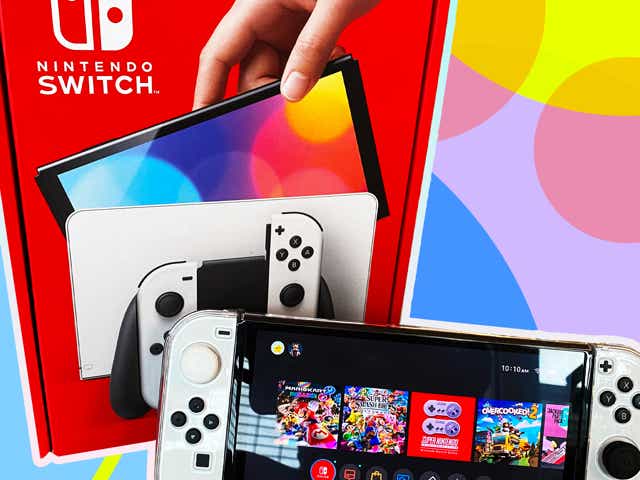 Nintendo Switch OLED against a rainbow background