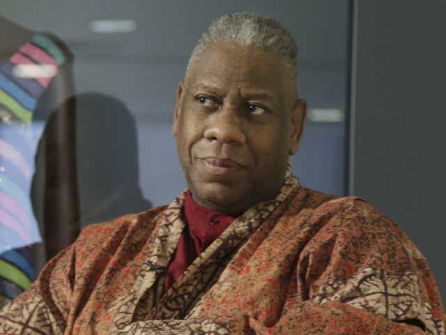 André Leon Talley, a former editor at large for Vogue magazine, speaks to a reporter