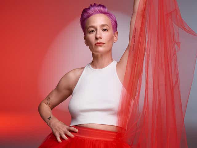 megan rapinoe in red tulle skirt and white top