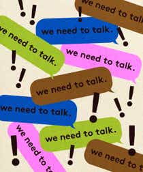 Overlapping text messaging bubbles in different colours with the words "we need to talk." against a beige background