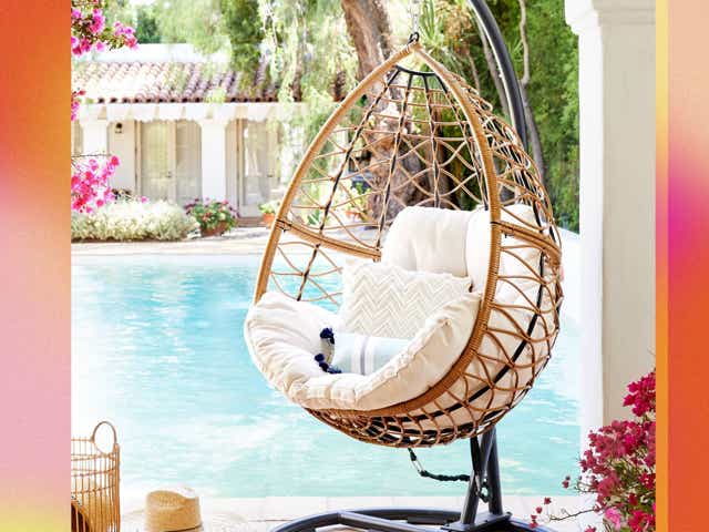 Hanging egg chair by poolside