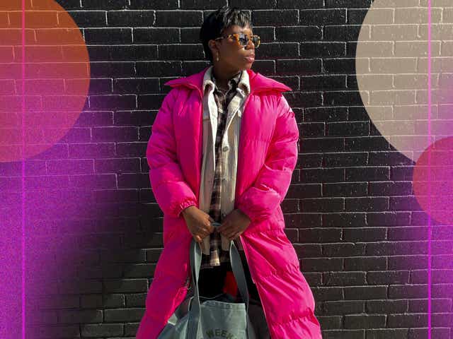 Black girl in pink coat