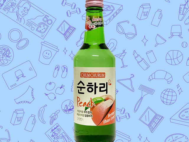 A bottle of Chum Churum Peach soju against a blue background