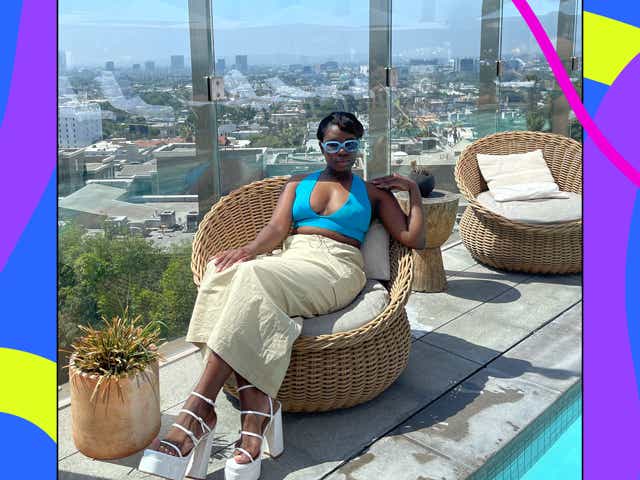 Black woman relaxing by the pool