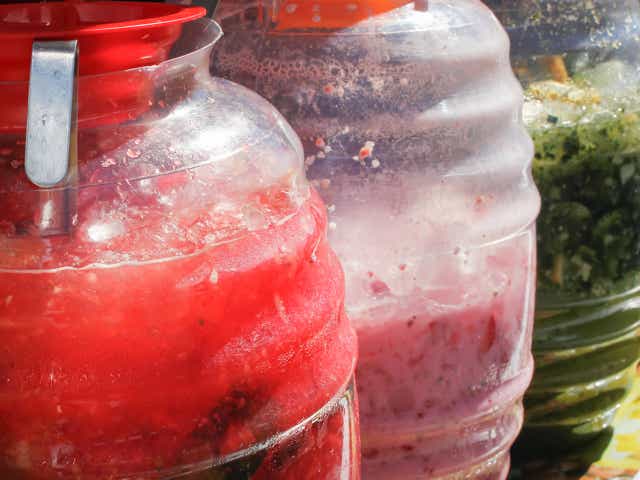 A view of large vats of aguas frescas, seen at a local Mexican restaurant.