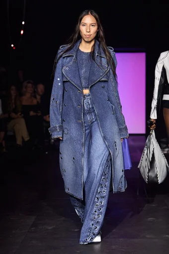 Quannah Chasinghorse wearing an all-denim look at the Chloe Spring 2023 show.