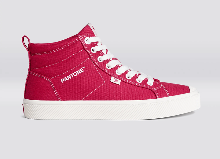 A sneaker in Viva Magenta color.
