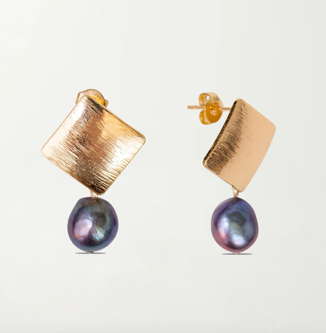 Shop the top jewelry trends for summer 2023: Pearls, hoops, and more -  Reviewed