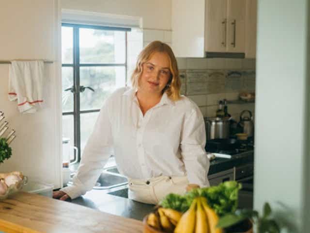 photo of chef Jamie Yates standing in her kitchen