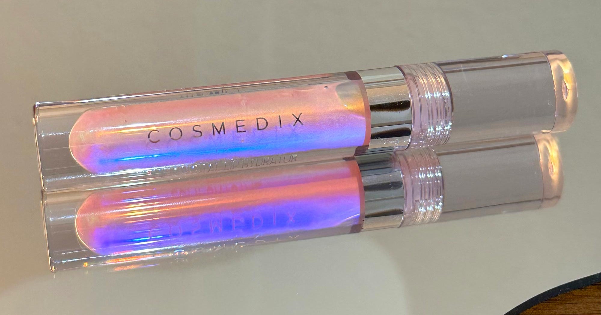 This Hydrating Crystal Lip Gloss Is A Y2K Prismatic Dream