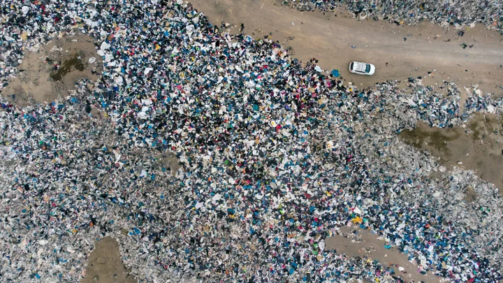 Aerial view of used clothes discarded in the Atacama desert, in Alto Hospicio, Iquique, Chile