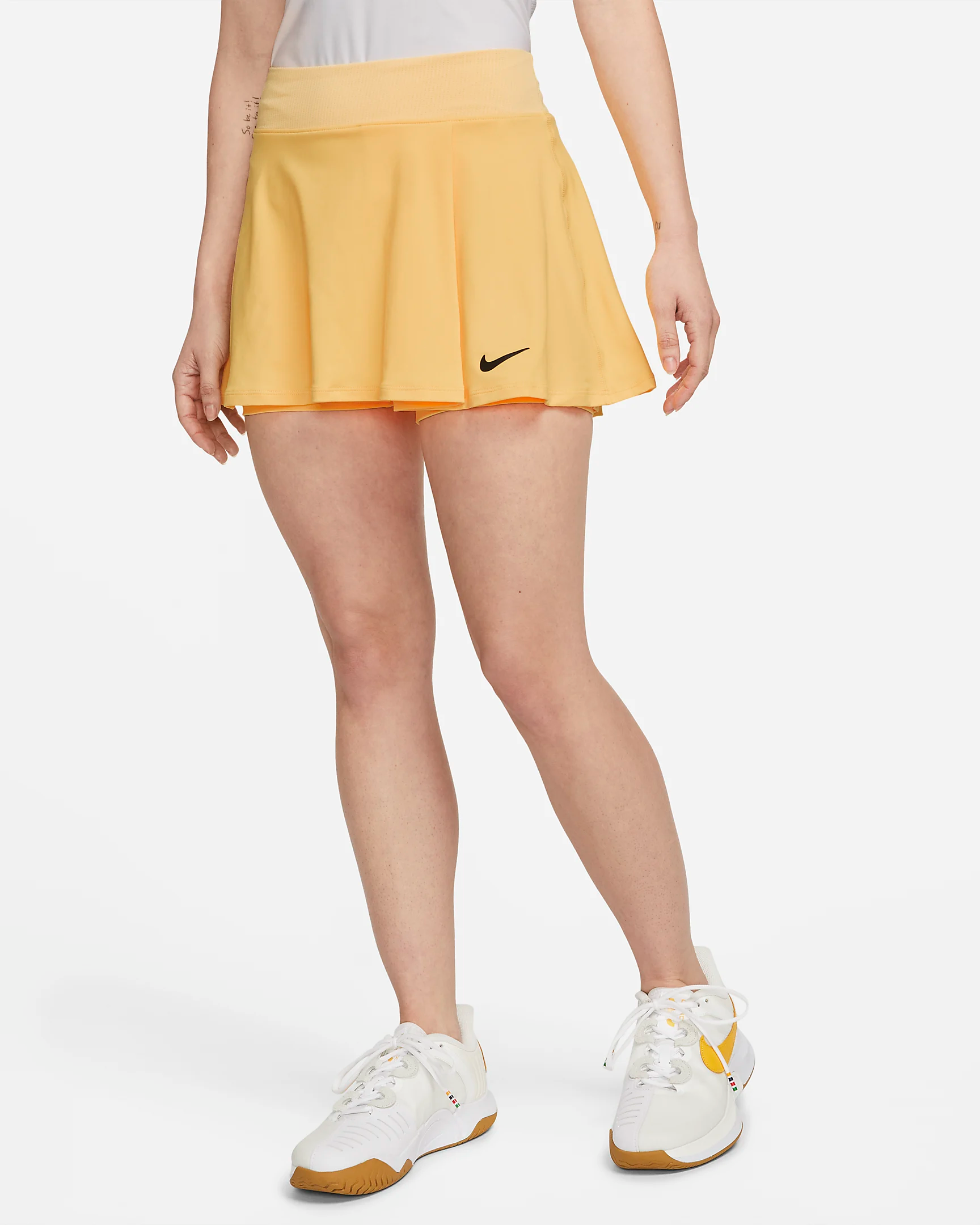 NikeCourt + Women’s Flouncy Skirt