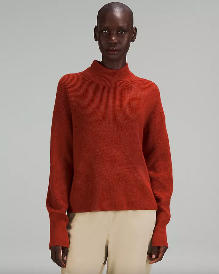 Baggy orange turtleneck sweater on sale