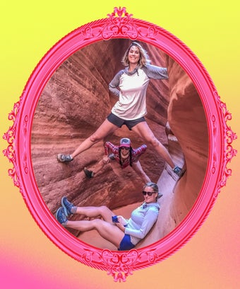 Three women hikers in a red rock canyon