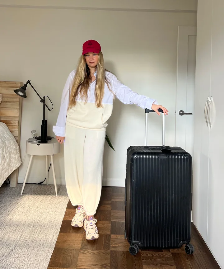 irina grechko with her rimowa Essential Check-In Large