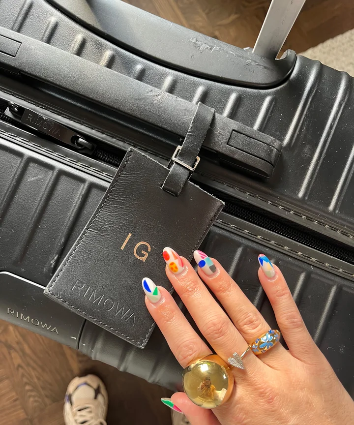 irina grechko with her rimowa Essential Check-In Large
