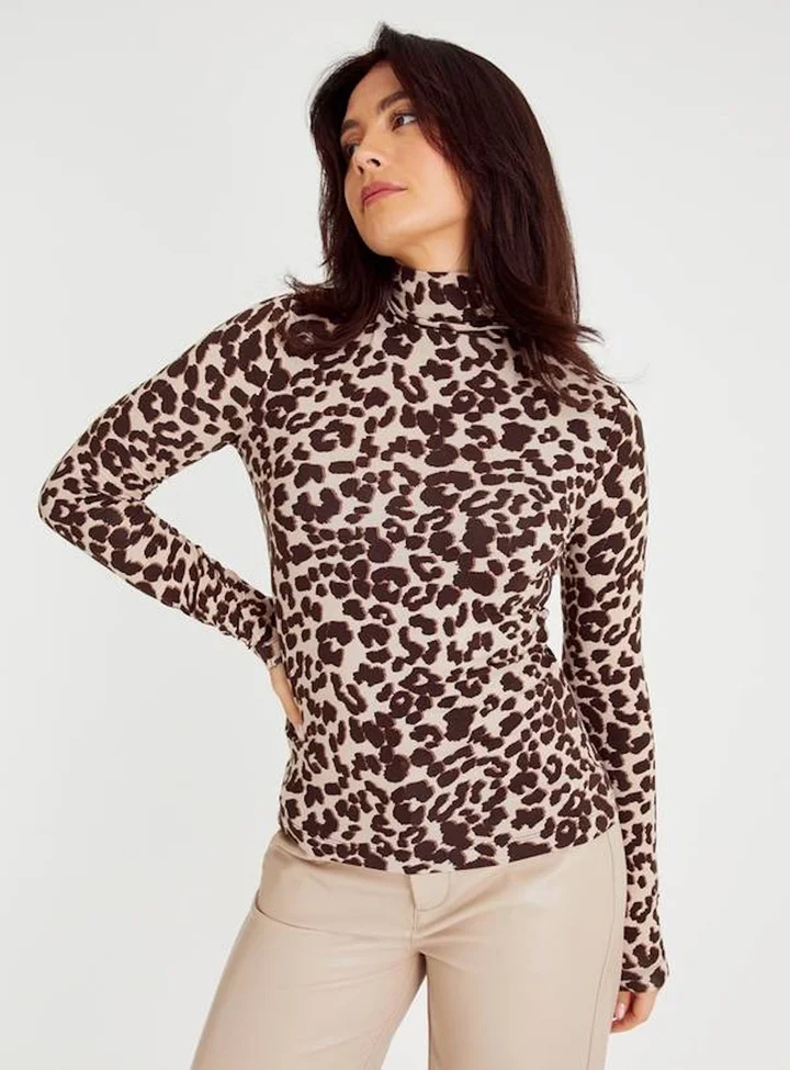 Model in leopard print roll neck