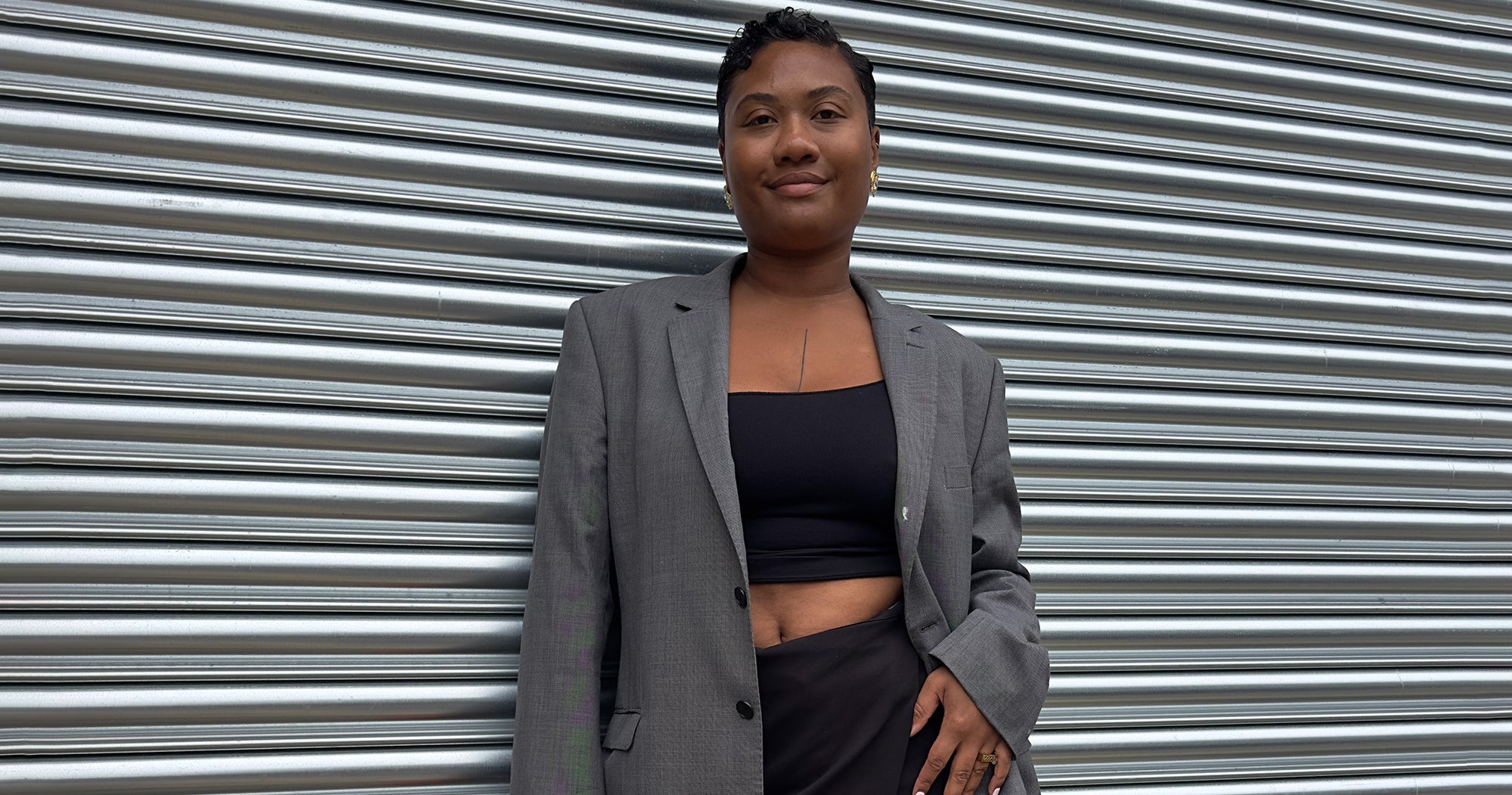 How To Style Skirts Over Jeans And Trousers