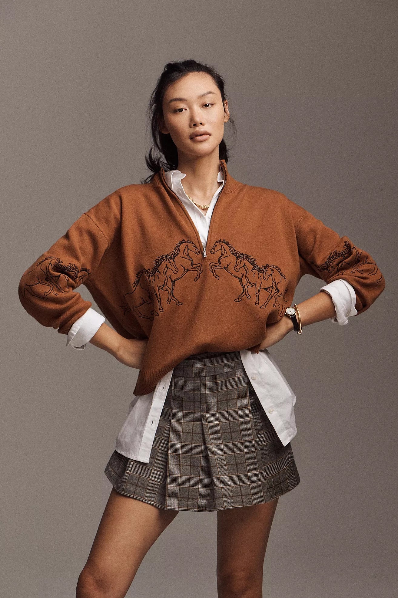 How To Style Skirts Over Jeans And Trousers