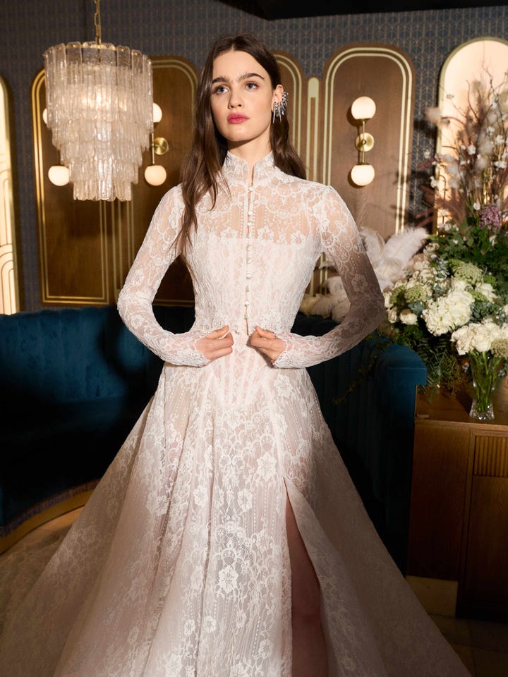 A model in lace dress from Gala by Galia Lahav's Spring 2026 collection.