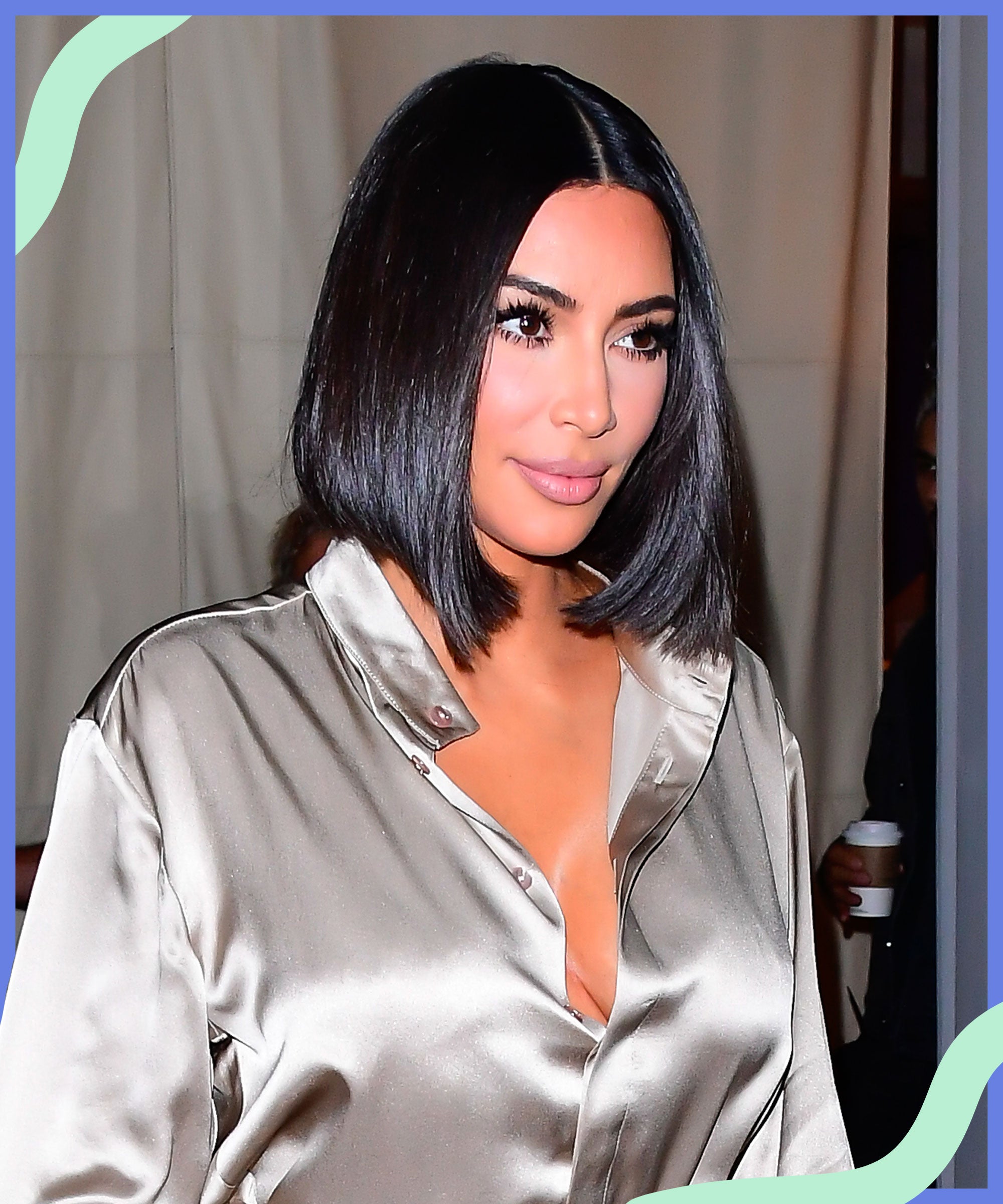 Image of Kim K black blunt bob with a center part
