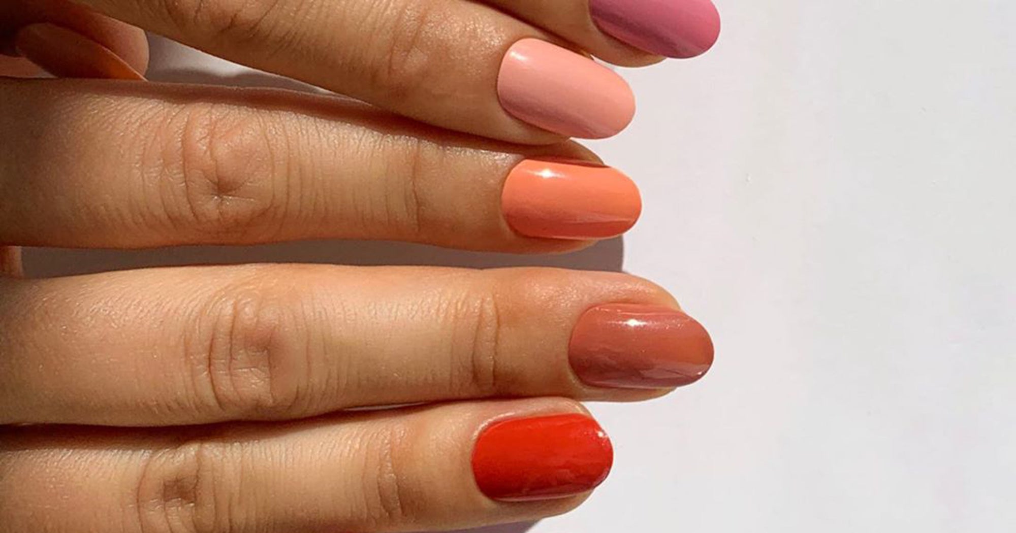 nail design with orange polish