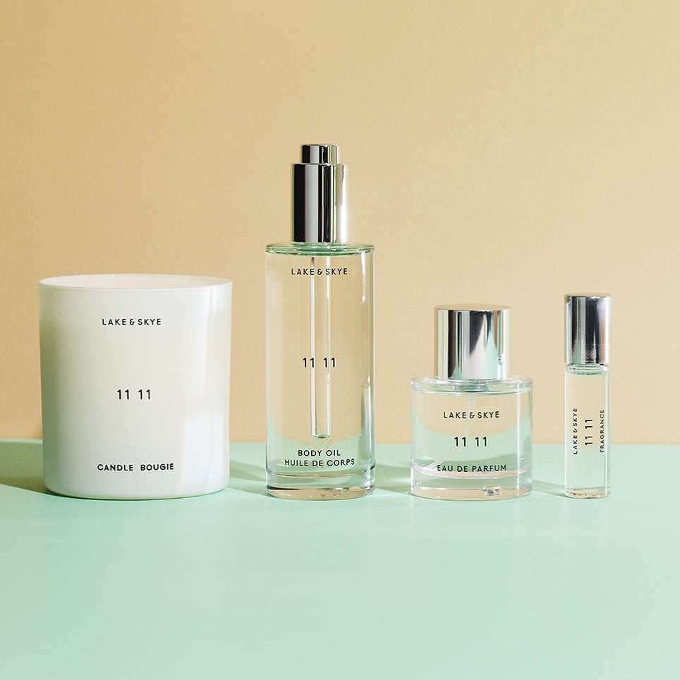 The image shows four products of Lake & Skye : Candles, Body Oils and perfumes 