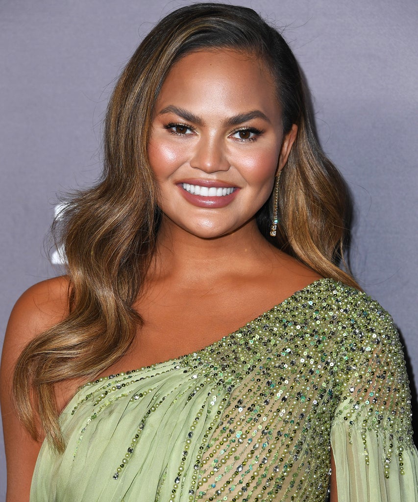 Chrissy Teigen Melania Trump,