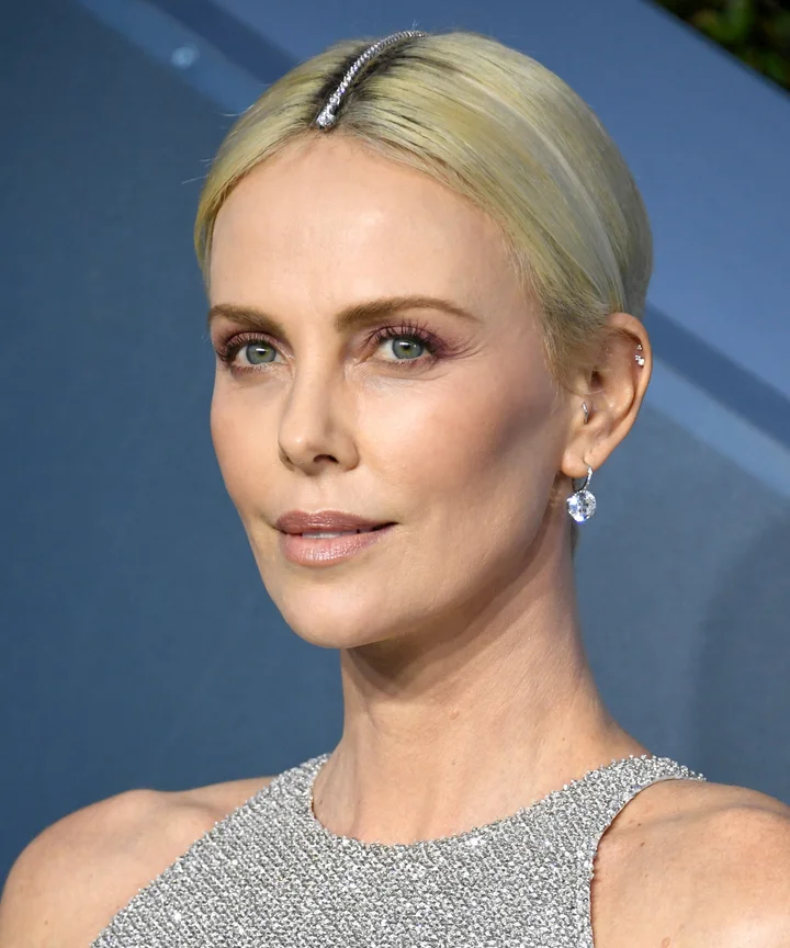 Charlize Theron Wore Tiffany Necklace To Hide Her Roots