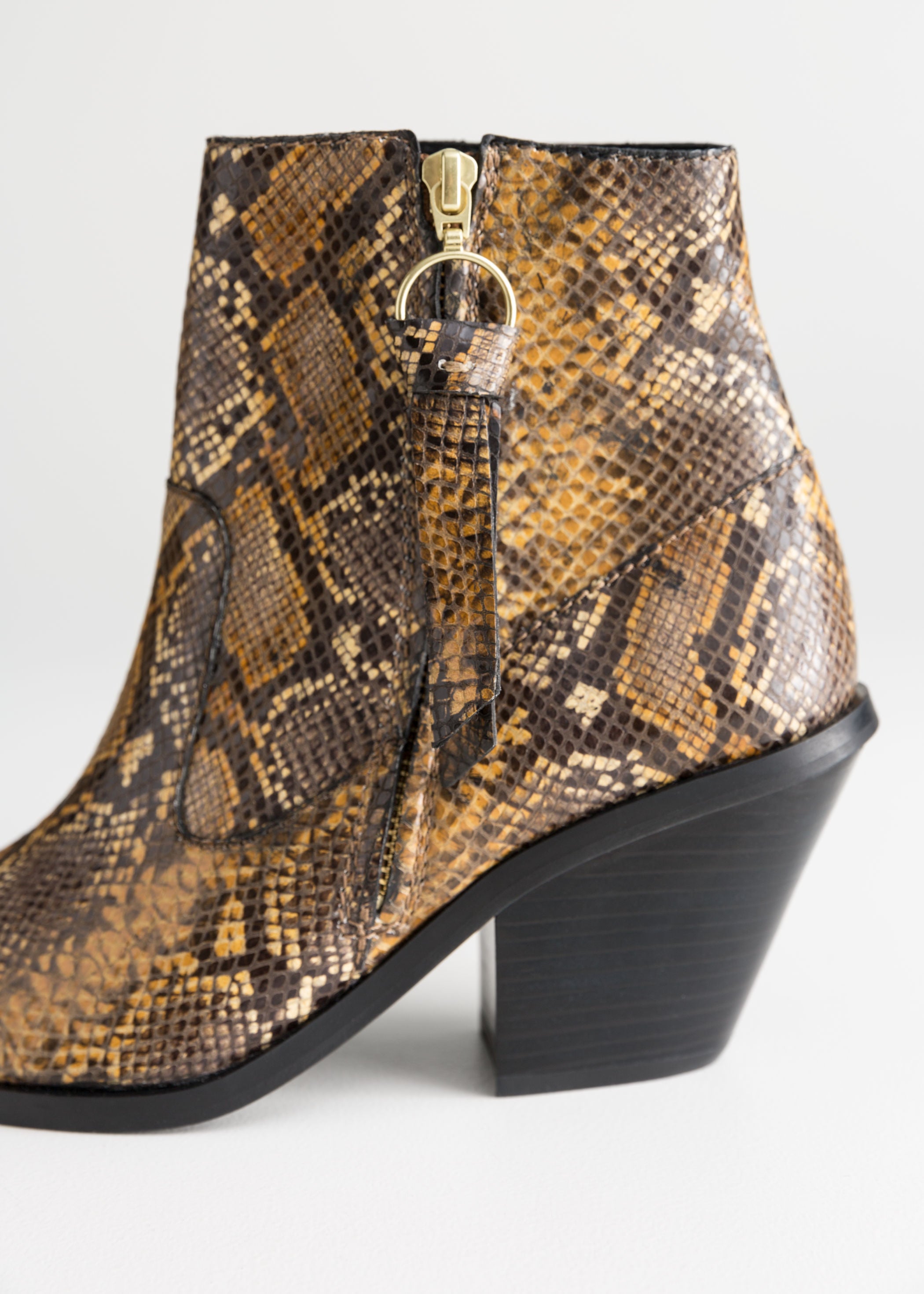 Other stories snake boots top