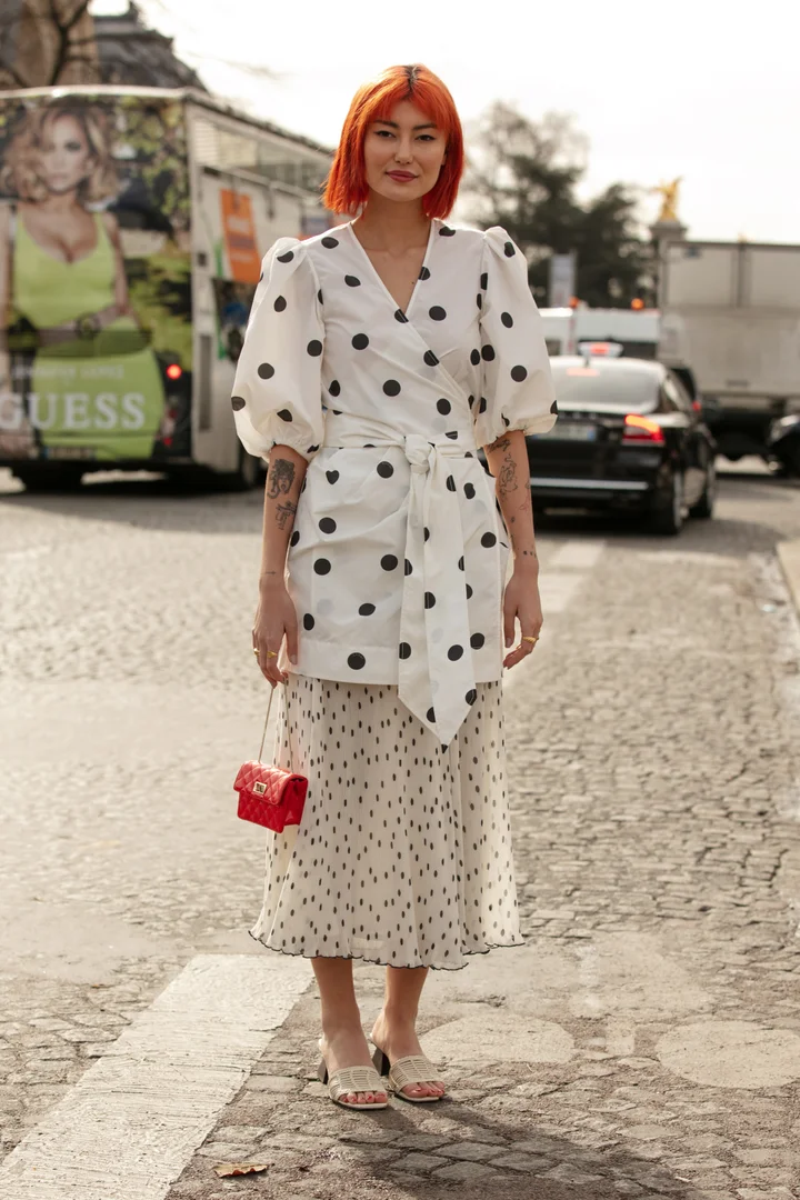 Xenia Adonts is seen wearing laced Dior boots outside Dior on July