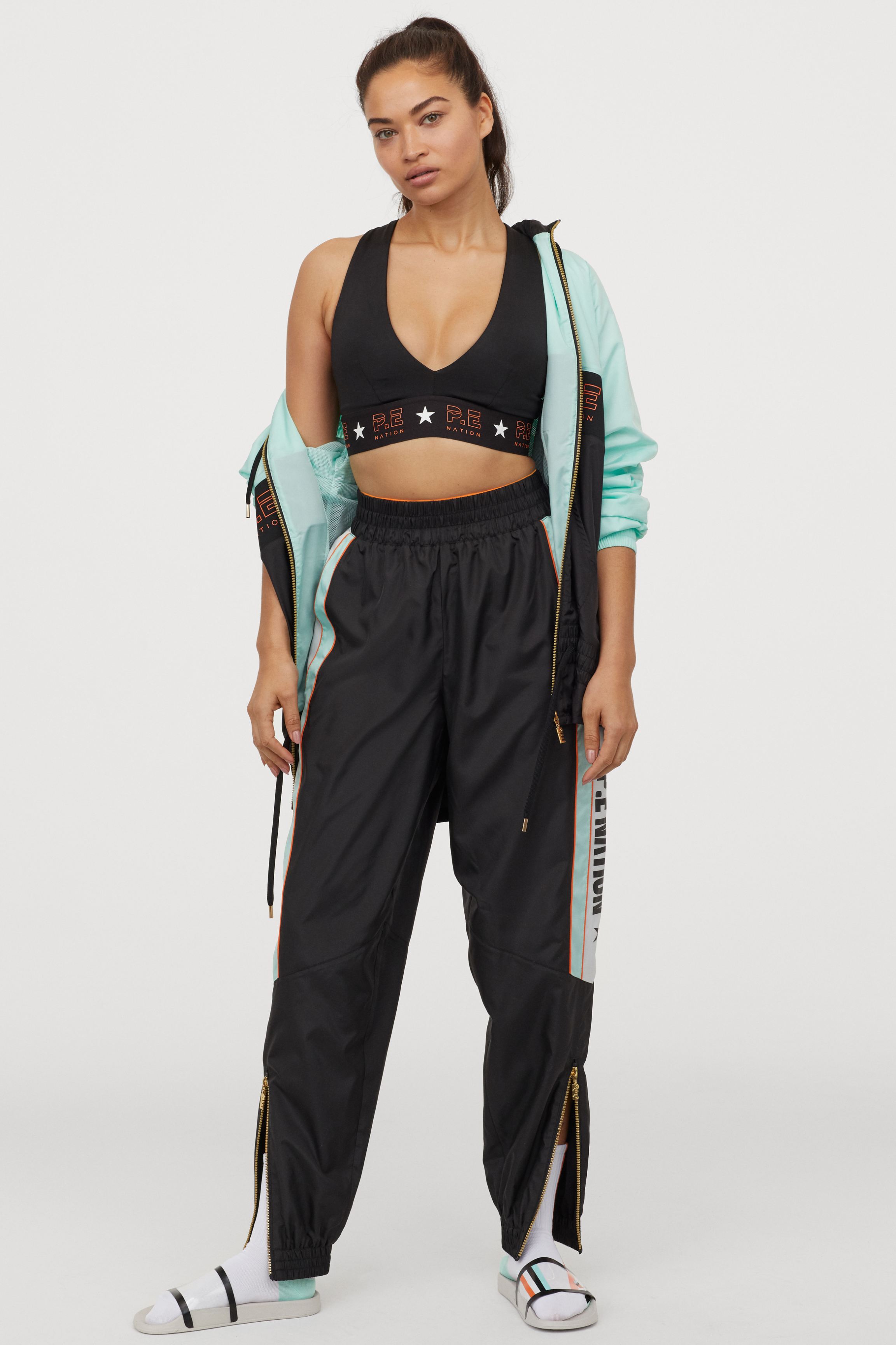 H&M x P.E. Nation Padded Sports Bra and Ankle-Length Scuba Leggings, H&M  Collaborated With P.E. Nation to Make Your Favourite Activewear More  Affordable