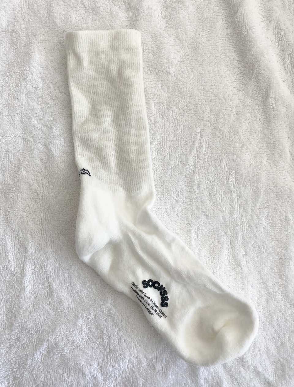 Photo of a white sock.