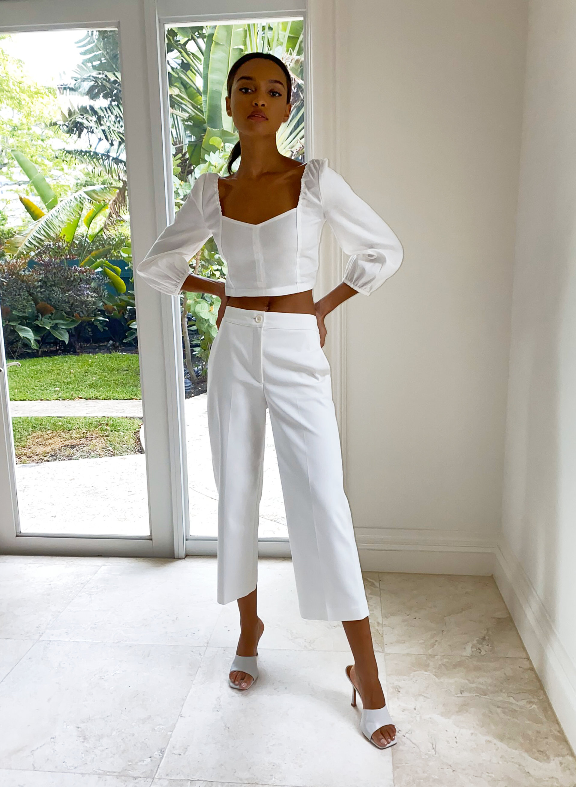Babaton + High-rise pleated trousers